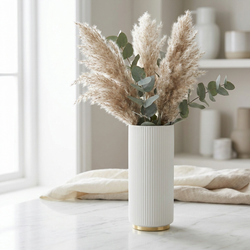 Arca Ribbed Ceramic Vase with dried pampas grass and eucalyptus on marble surface